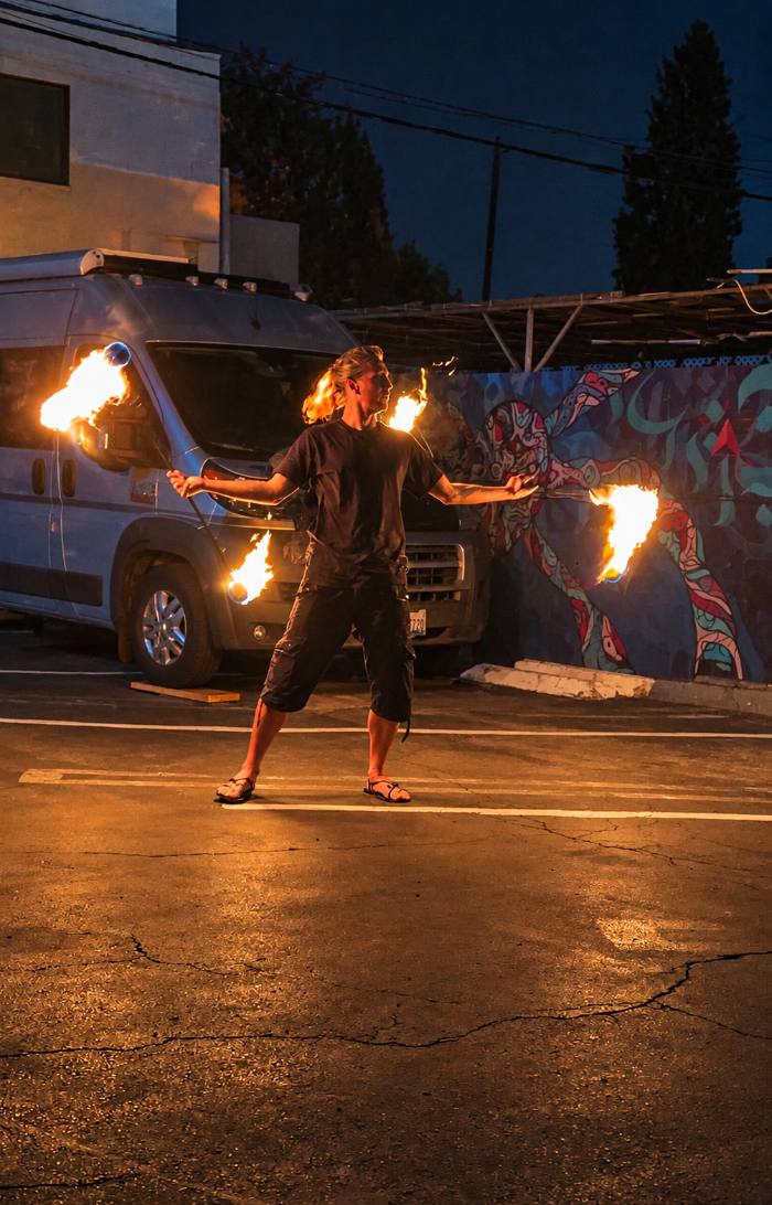 Fire dancer mid-spin, long exposure
